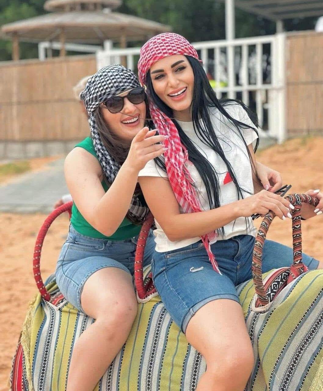 exploring Dubai's desert in a buggy, enjoying an adventurous ride together. exploring Dubai's desert in a buggy, enjoying an adventurous ride together.